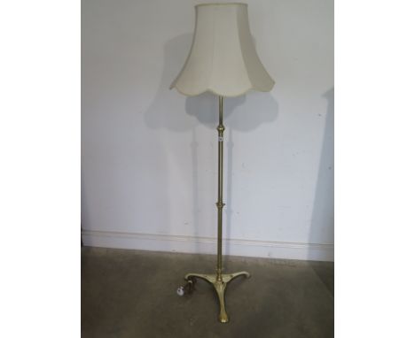 An Art Nouveau brass telescopic lamp stand and shade 
Condition report: Working and tested
