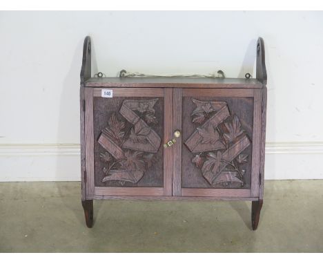 A carved oak Art Nouveau wall cabinet circa 1900 - Height 61cm x Width 54cm x Depth 17cm