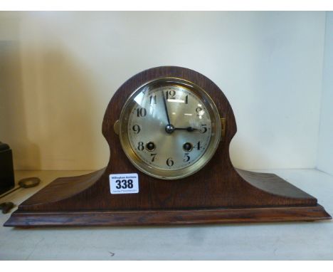 An early 20th century oak cased dome topped mantel clock with Arabic numerals - Width 37cm 
Condition report: In working orde