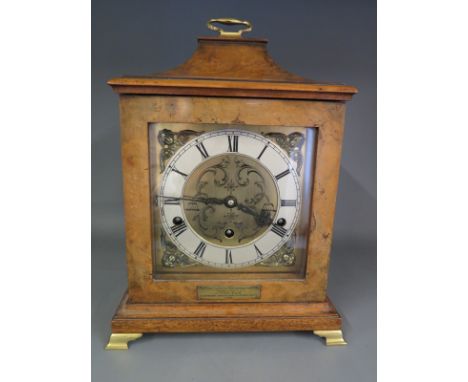 A walnut cased mantel clock by Mappin & Webb with brass dial, silvered chapter ring with Roman numerals, striking on the 1/4,