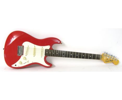 Squier Bullet by Fender electric guitar, made in Korea, ser. no. E900344, red finish with some light surface marks, electrics