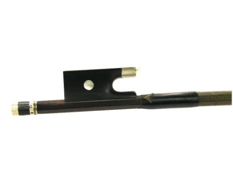 French nickel mounted violin bow probably of the Ouchard School, unstamped, the stick round, the ebony frog inlaid with pearl