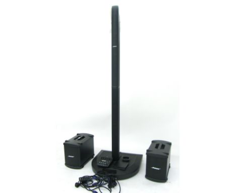 Bose L1 audio system comprising L1 power stand, two L1 cylindrical radiator loudspeakers, two B1 base units, one Tonematch T1