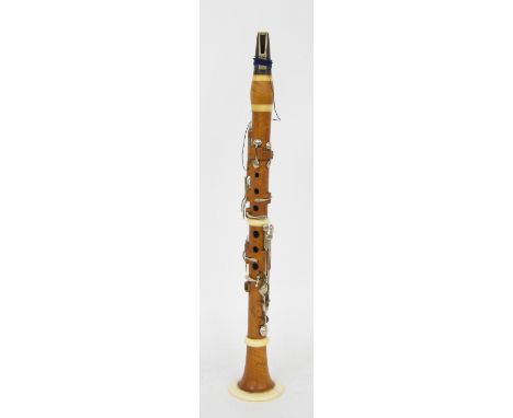 Austrian boxwood and ivory mounted thirteen keyed Eb clarinet by and stamped L.T. Uhlman, Wien, circa 1840