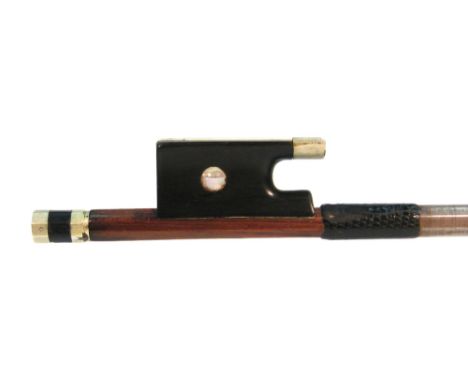 Good French nickel mounted violin bow of the Peccatte School, the stick round, the ebony frog inlaid with pearl eyes (one mis