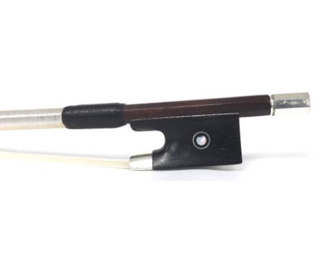 French silver mounted violin bow by and stamped Louis Bazin, the stick round, the ebony frog inlaid with silver rings enclosi