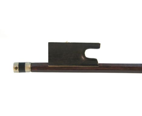 French nickel mounted violin bow of the Peccatte School, the stick round, the ebony frog plain and the ebony adjuster with tw