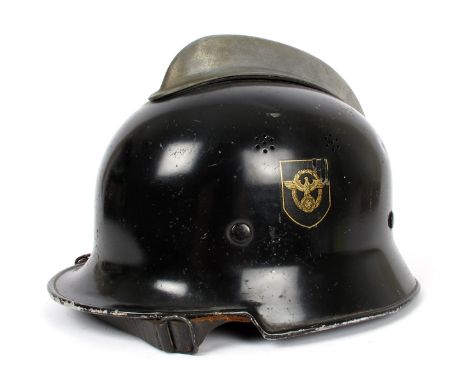 1933-1945 German Third Reich, Fire Police (Feuerschutzpolizei) double decal helmet and axe. (2) With leather liner and chin s