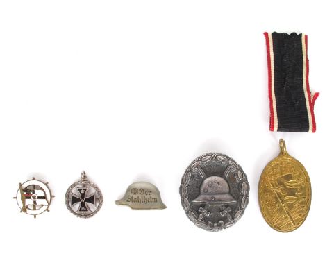 1914-1918 German wound badge, veteran's badge, sweetheart brooch and Old Comrades badge. (5) WWI German silver wound badge; a