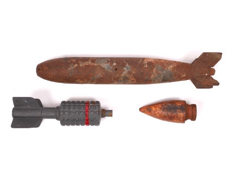 1914-1918 World War I, ordnance collection.  (3) A German mortar round, an aerial bomb and a solid artillery nose-cone. (3) 