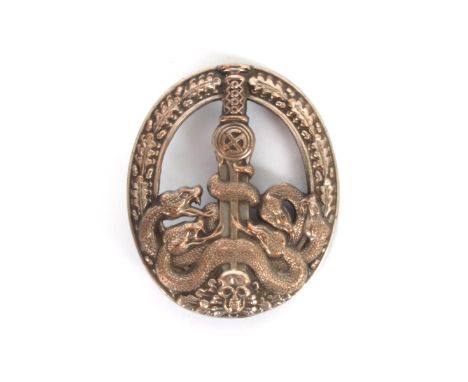 1939-1945 German Third Reich, Anti Partisan badge. Comprising a skull and crossed bones surmounted by a sword and five snake 