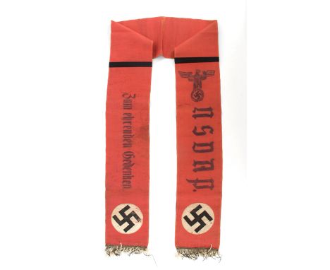 1939-1945 German Third Reich. NSDAP funeral sash. A red cloth sash, with white and gilt bullion fringes and swastika roundels