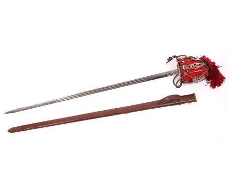 1914-1918 World War I, Scottish basket hilted sword. The straight double-fullered blade etched with the Royal coat of arms an