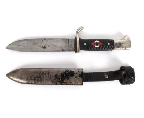 1933-1945 German Third Reich, Hitler Youth knife. By RZM the plain blade numbered M7/49 and dated 1938. In metal scabbard, mo