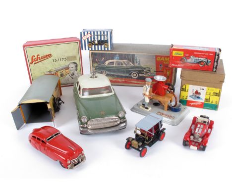 German tin-plate and die-cast models, boxed. A Schuco 15/175 gift set comprising a Schuco garage no. 1500, yellow lithograph 