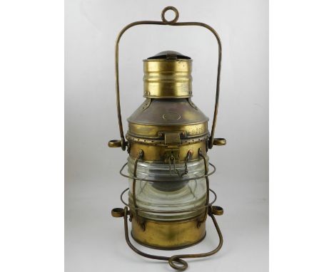 An early 20th century brass mast head lamp by Davey & Co. London, numbered 8399, H. 47cm