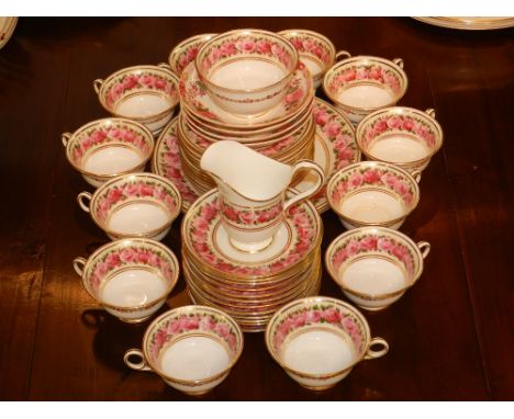A Crescent & Sons part tea service, decorated with a border of roses within gilt borders, to include tea cups and suacers, si