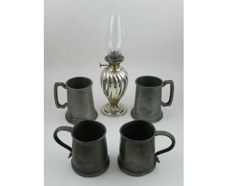 A silver plated oil lamp, together with four pewter mugs.