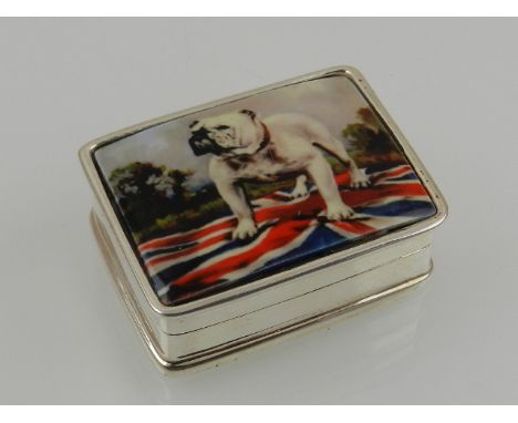 A white metal pill box of rectangular form, decorated with an enamel plaque depicting an English bulldog and a Union Jack, st