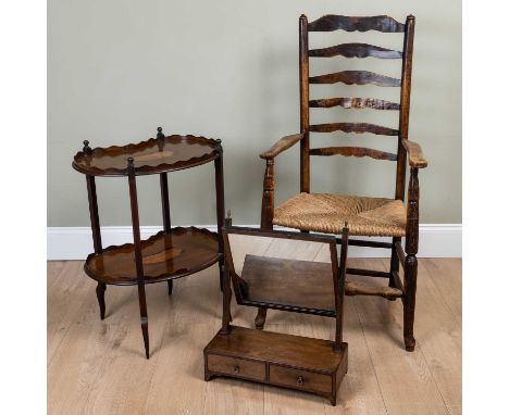 A kidney shaped two tier occasional table with decorative inlay, 58cm wide x 74cm high; together with an old ash country ladd