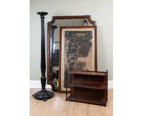 A large oak framed wall mirror with a shaped bevelled mirror plate, 100cm wide x 154cm high; together with a decorative print