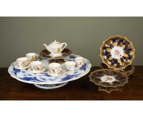 A large blue and white English ceramic Lazy Susan or stand, 50cm diameter; together with a part Aynsley dessert service; and 