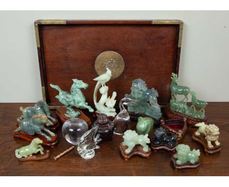 A collection of modern jade to include Dogs of Fo, deer and exotic birds, the largest 18cm high together with glass animal fi