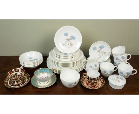 A Wedgewood ice rose pattern part dinner and tea service, with five dinnerlates, six dessert plates, seven tea plates, six sa