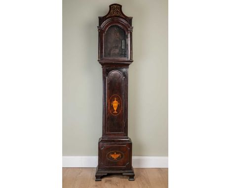 An Edwardian mahogany longcase clock case, for a movement with arching dial, with decorative classical urn inlay and pierced 