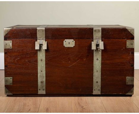 A hardwood metal bound trunk with green lined interior, 86cm wide x 52cm deep x 46cm highTop of trunk with cracks, marks and 