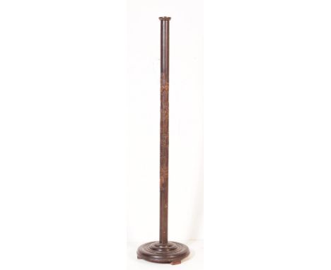 A 20th century Chinese carved Singapore hardwood floor standing standard lamp. The lamp having carved details to shaft depict