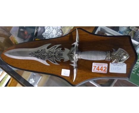 Stainless steel fantasy knife on a wooden display stand. Not available for in-house P&amp;P 