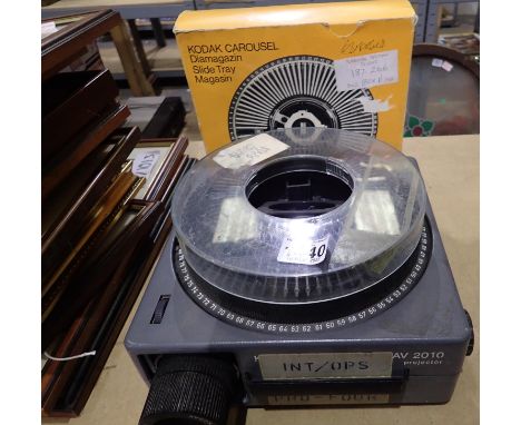 Kodak AV2010 projector with an extra Kodak carousel. P&amp;P Group 3 (£25+VAT for the first lot and £5+VAT for subsequent lot