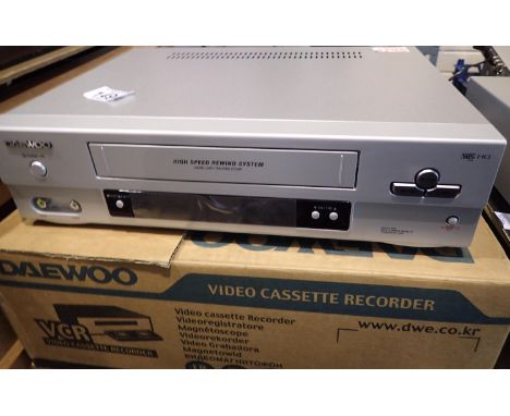 Daewoo ST23OP VCR, boxed. All electrical items in this lot have been PAT tested for safety and have passed. This does not con