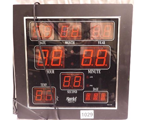Ajanta quartz perpetual calendar digital clock, model OLC-106. P&amp;P Group 2 (£18+VAT for the first lot and £3+VAT for subs