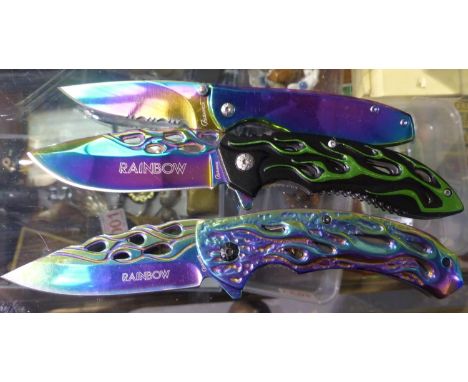 Three folding Rainbow knives, longest blade L: 80 mm. P&amp;P Group 1 (£14+VAT for the first lot and £1+VAT for subsequent lo
