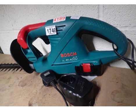 Bosch AHS 41ACCU battery hedge trimmer, with battery and changer. All electrical items in this lot have been PAT tested for s