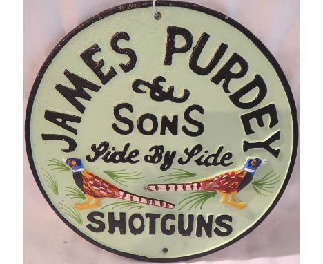 Cast iron James Purdey &amp; Sons shotguns plaque, W: 30 cm. P&amp;P Group 1 (£14+VAT for the first lot and £1+VAT for subseq