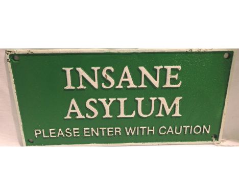 Cast iron Insane Asylum sign, W: 30 cm. P&amp;P Group 1 (£14+VAT for the first lot and £1+VAT for subsequent lots) 
