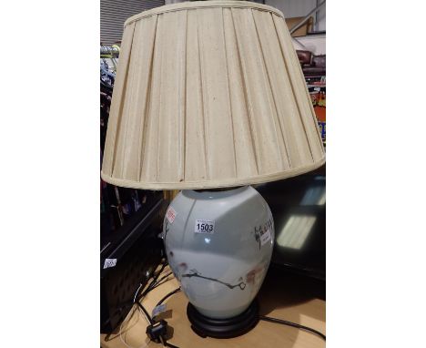 Large Oriental ceramic lamp with cherry blossom design and shade, H: 70 cm. All electrical items in this lot have been PAT te