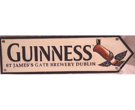 Cast iron Guiness toucan arrow, W: 50 cm. P&amp;P Group 1 (£14+VAT for the first lot and £1+VAT for subsequent lots) 