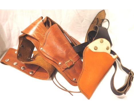 Two leather holsters, one for a Peacemaker revolver. P&amp;P Group 1 (£14+VAT for the first lot and £1+VAT for subsequent lot