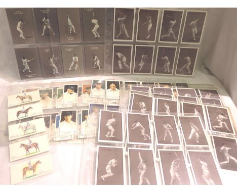 Approximately 200 reproduction sporting cigarette cards, cricket and horseracing. P&amp;P Group 1 (£14+VAT for the first lot 
