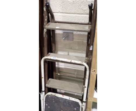 Two pairs of metal step ladders. Not available for in-house P&amp;P 