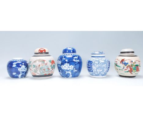 A collection of five Chinese ceramic ginger jars to include two painted in the prunus pattern (one complete with lid), two Ch