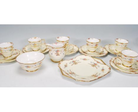 A vintage 20th Century 1940's Shelley six person tea service consisting of cups, saucers, side plates and sandwich plate, eac