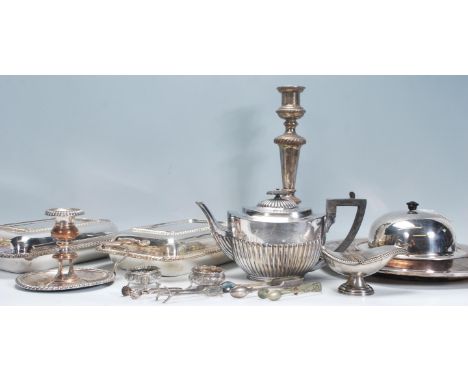 A mixed group of silver plate items dating from the early 20th Century to include a silverplate charger inscribed 'With the g