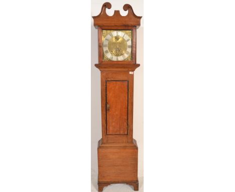 A 19th century West Country oak crossbanded brass faced longcase clock by A House of Marlborough. The brass face with silvere