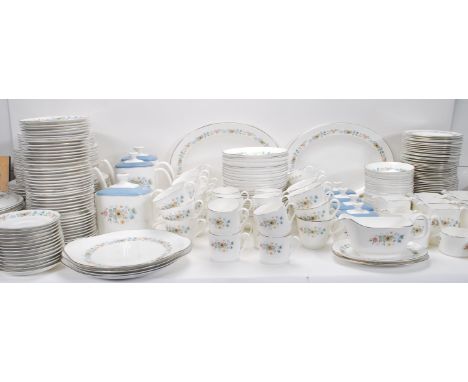An extensive Royal Doulton ' Pastorale ' dinner service comprising cups, saucers, plates, meat platters, tureens and many oth
