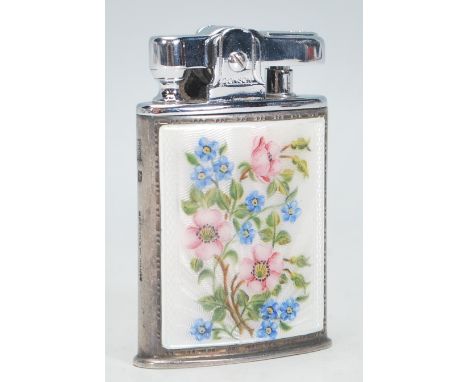 A vintage 20th Century Art Deco silver cased Ronson lighter Pat No. 621570. The silver case by Mappin &amp; Webb having a fro